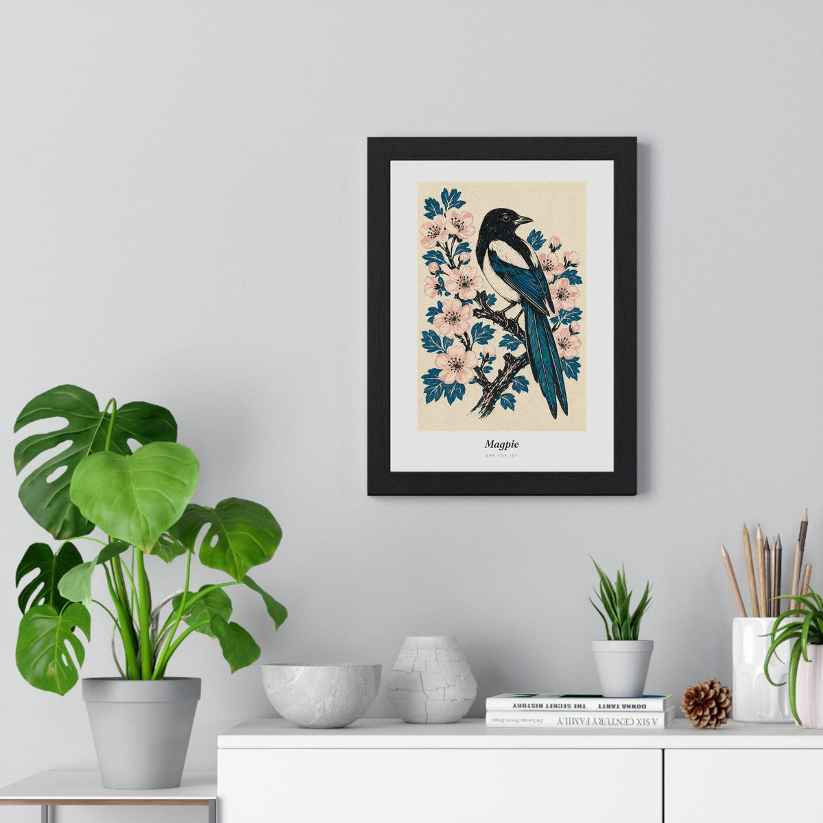 Magpie Print framed on a living room wall