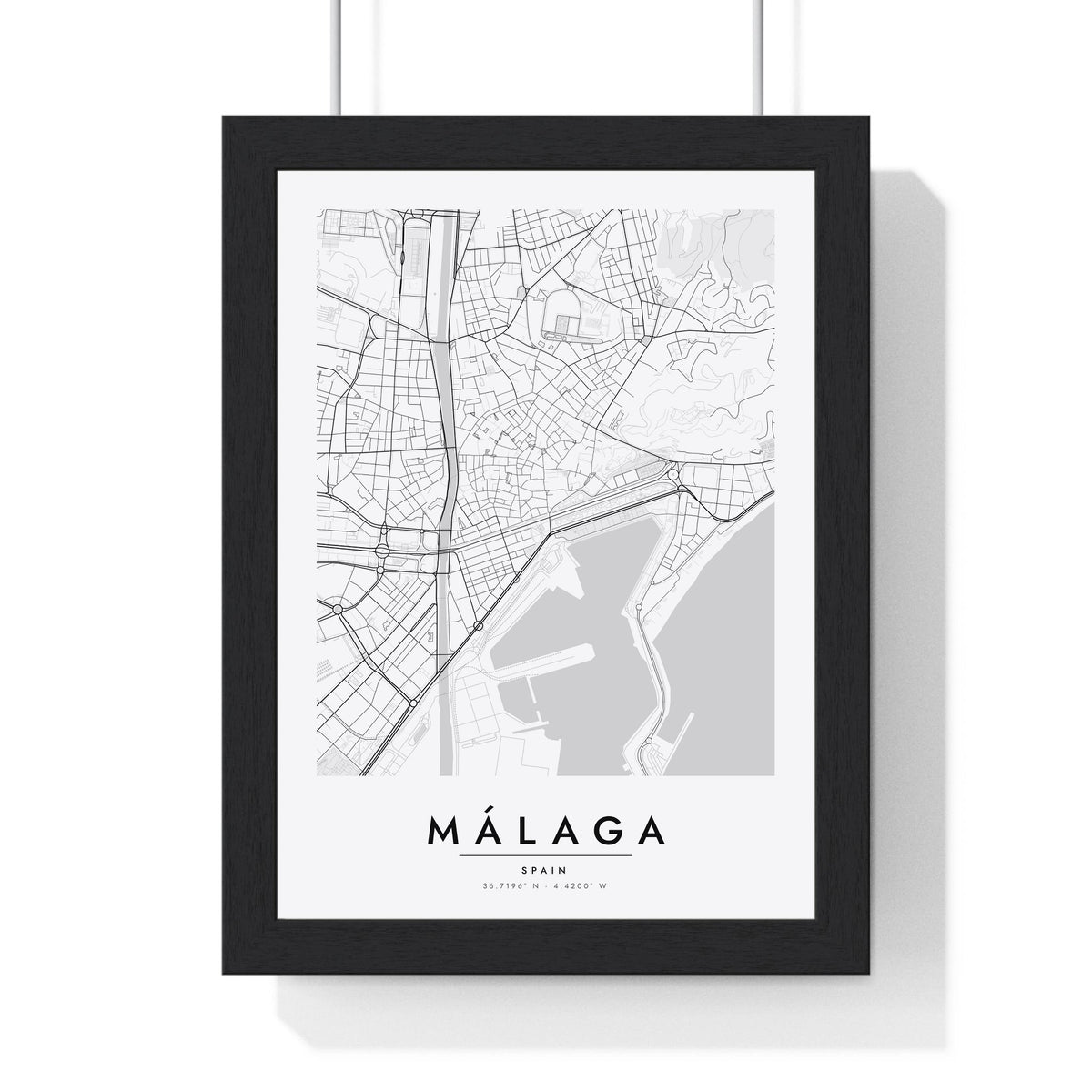 Málaga street map poster in white, minimal city map print framed in a black frame