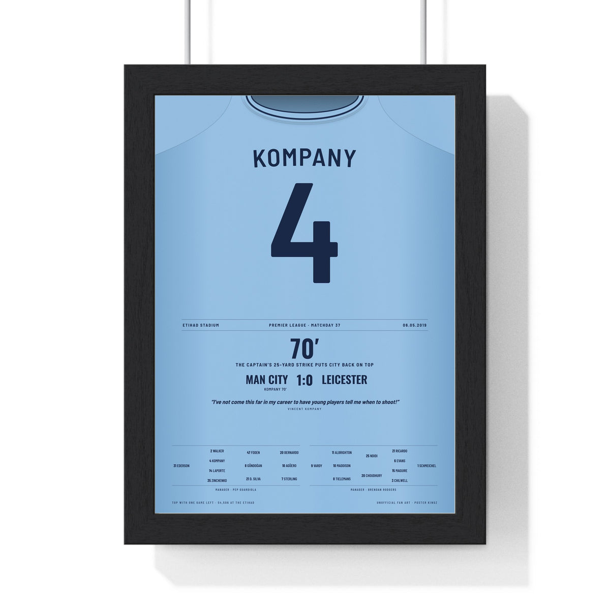 Man City Kompany Goal 2019 Poster - Vincent Kompany 4 v Leicester Etihad Shirt Print framed in a black frame, ready to hang
