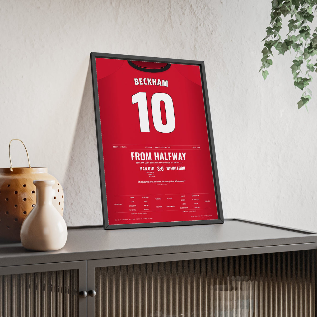 Man Utd Beckham Halfway Line Goal 1996 Poster - David Beckham 10 v Wimbledon Shirt Print framed and leaning on a sideboard