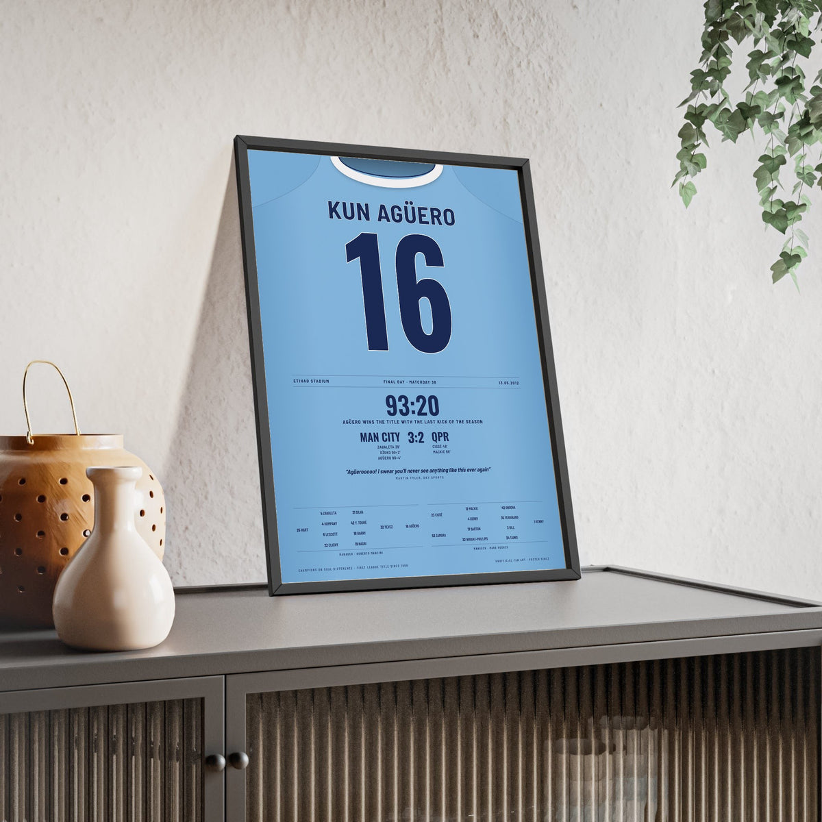 Manchester City Agüero 93:20 Shirt Print framed and leaning on a sideboard