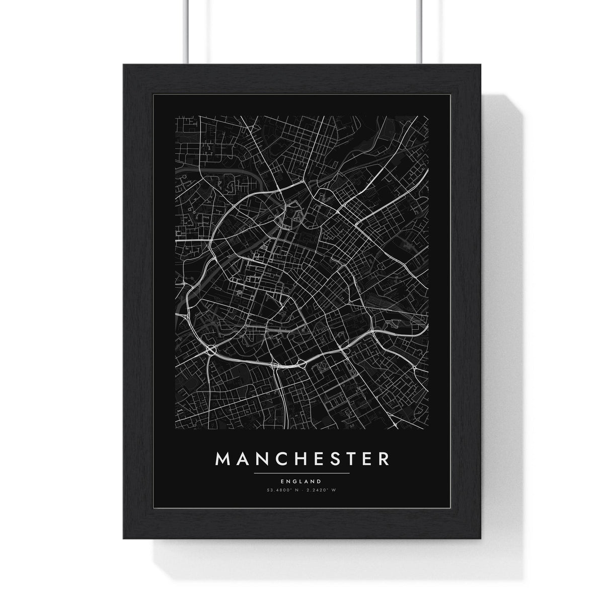Manchester street map poster in black, minimal city map print framed in a black frame