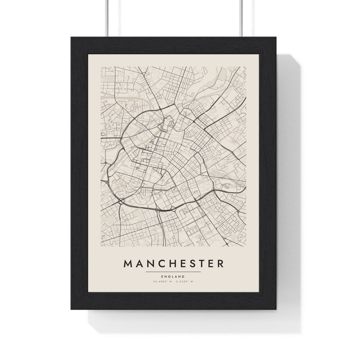 Manchester street map poster in cream, minimal city map print framed in a black frame