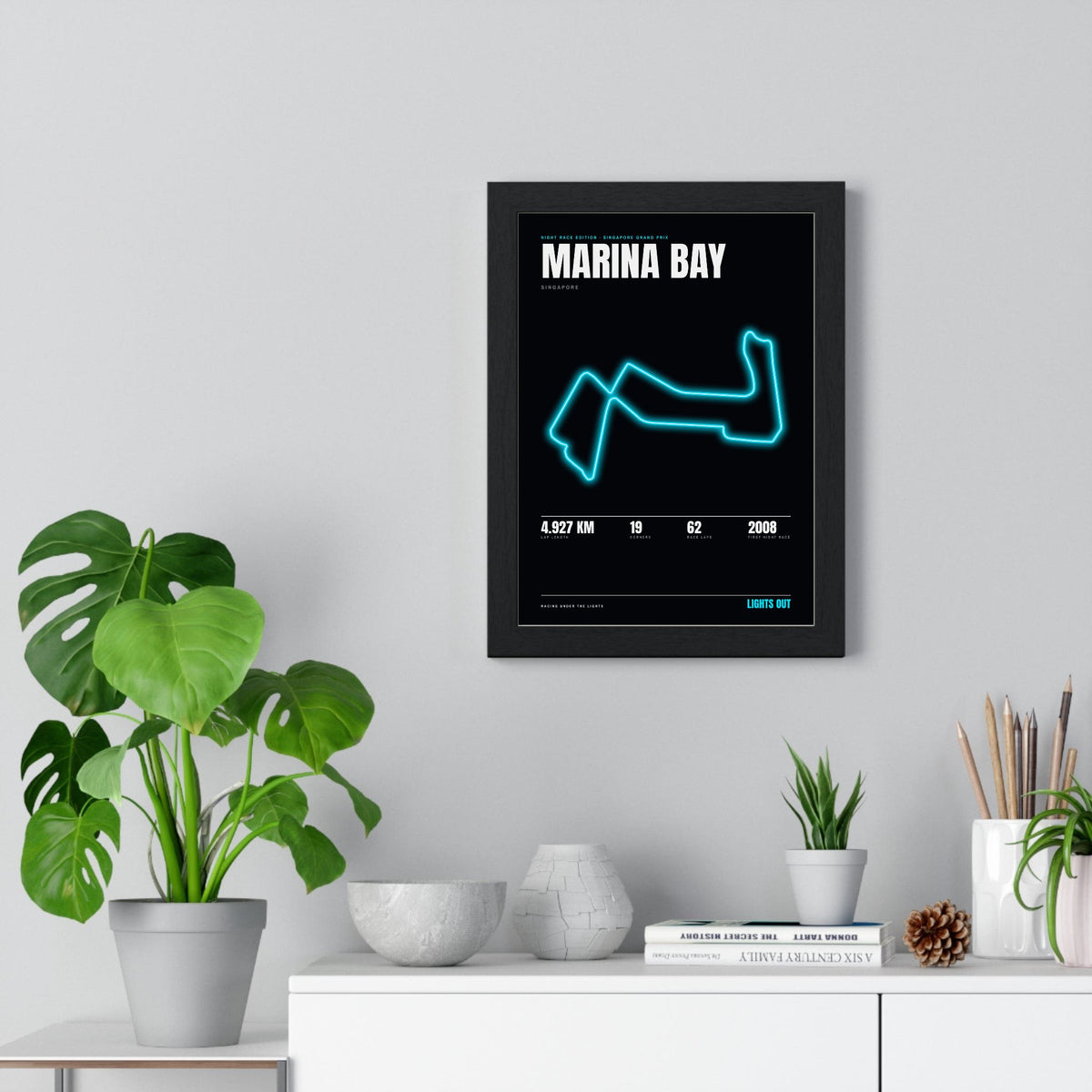 Marina Bay Night Race print framed on a living room wall