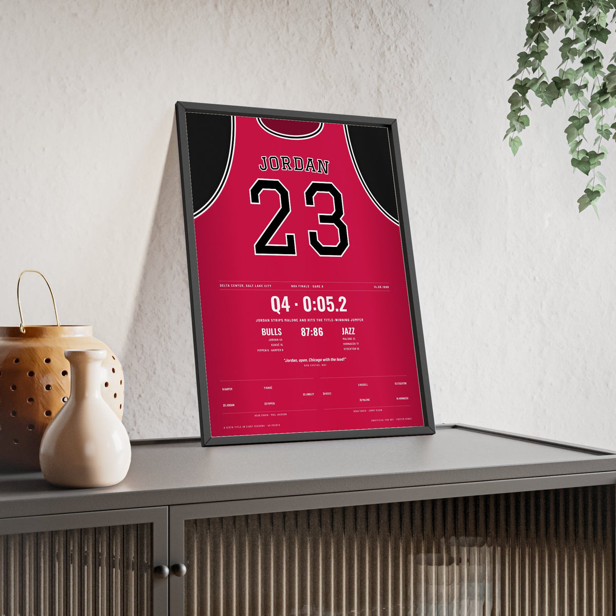 Michael Jordan 1998 NBA Finals Game 6 Poster - Chicago Bulls 23 Title-Winning Shot Jersey Print framed and leaning on a sideboard