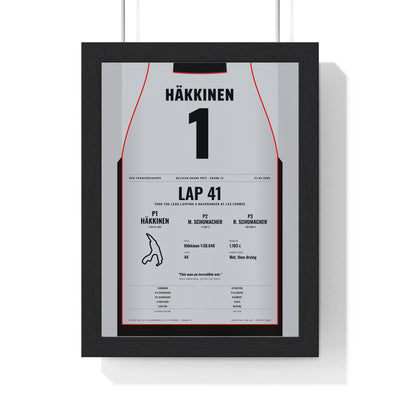 Mika Hakkinen 2000 Belgian Grand Prix Win Poster - 1 Race Suit Print framed in a black frame, ready to hang