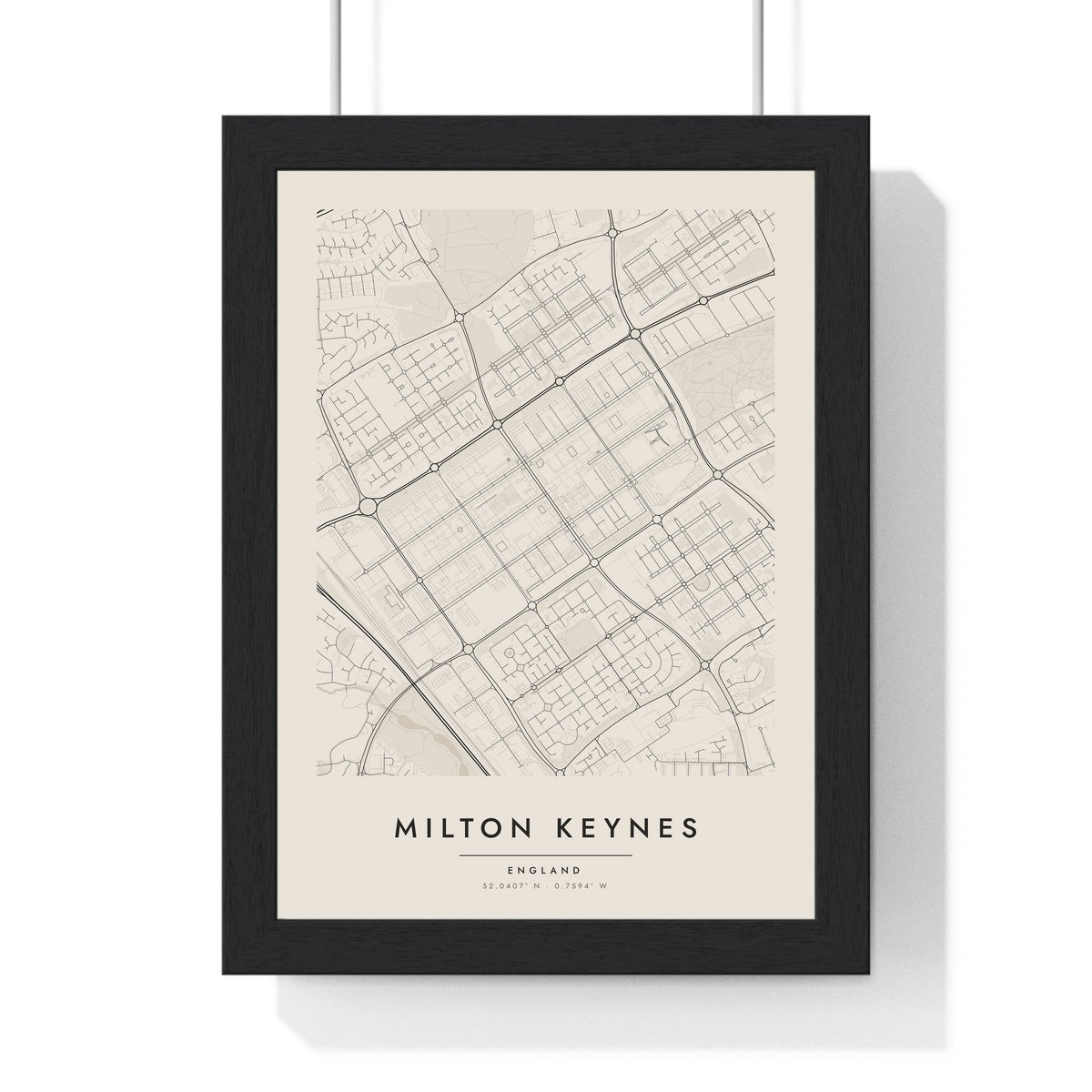 Milton Keynes street map poster in cream, minimal city map print framed in a black frame