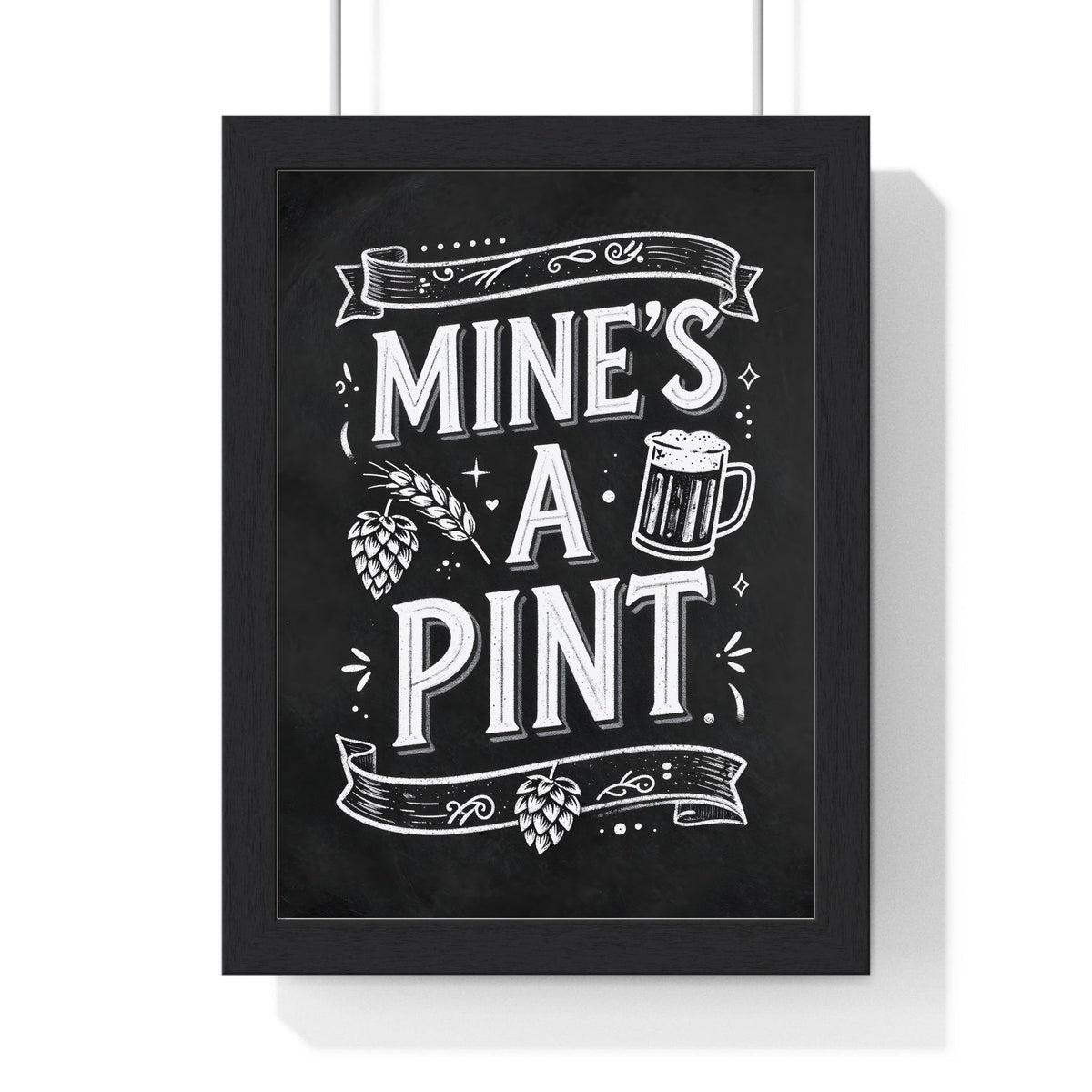 Mine's A Pint Chalkboard Print framed in a black frame, ready to hang