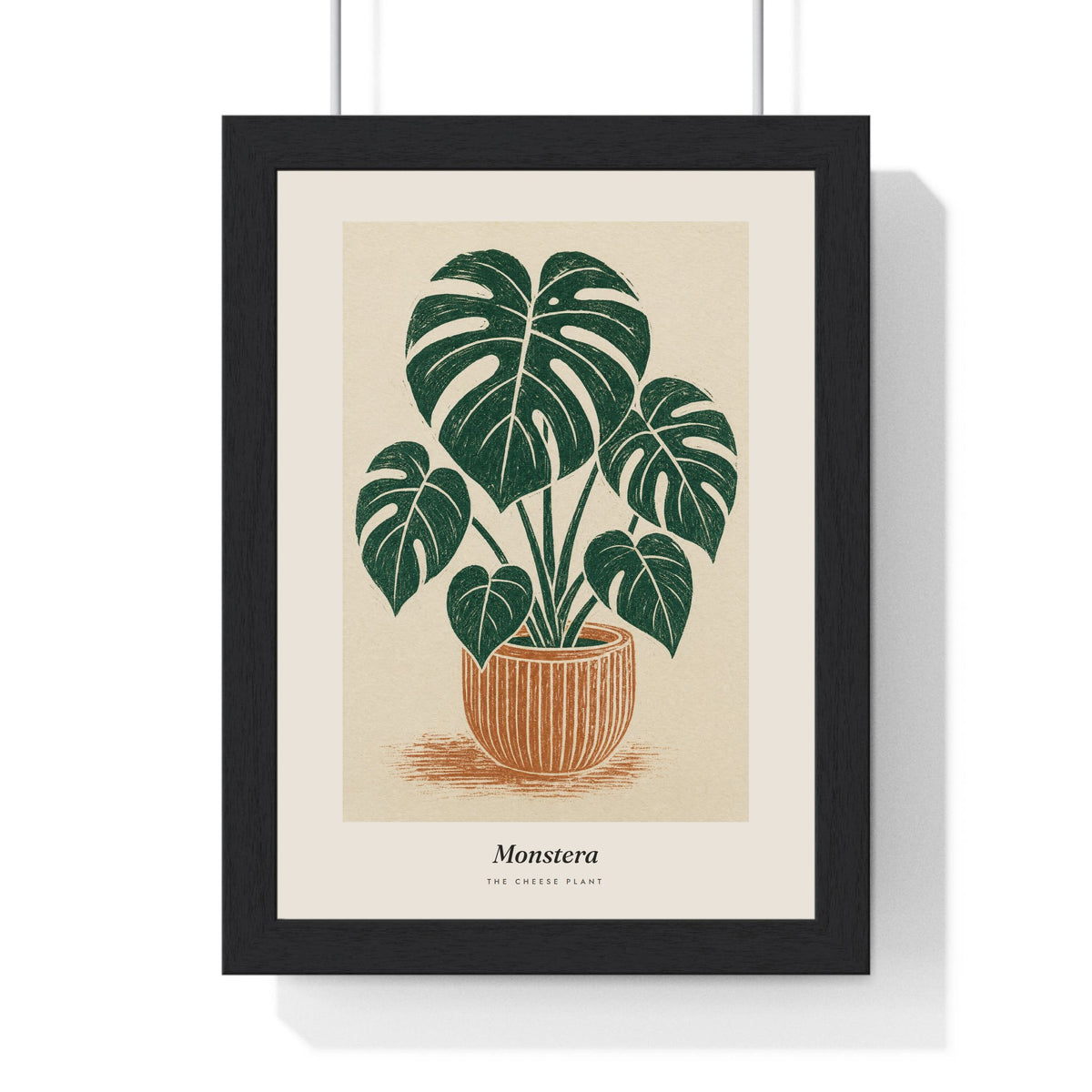 Monstera Lino Print framed in a black frame, ready to hang