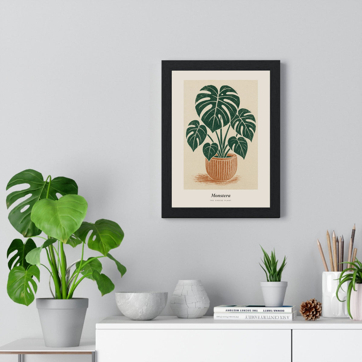 Monstera Lino Print framed on a living room wall