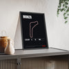 Monza Circuit print framed and leaning on a sideboard