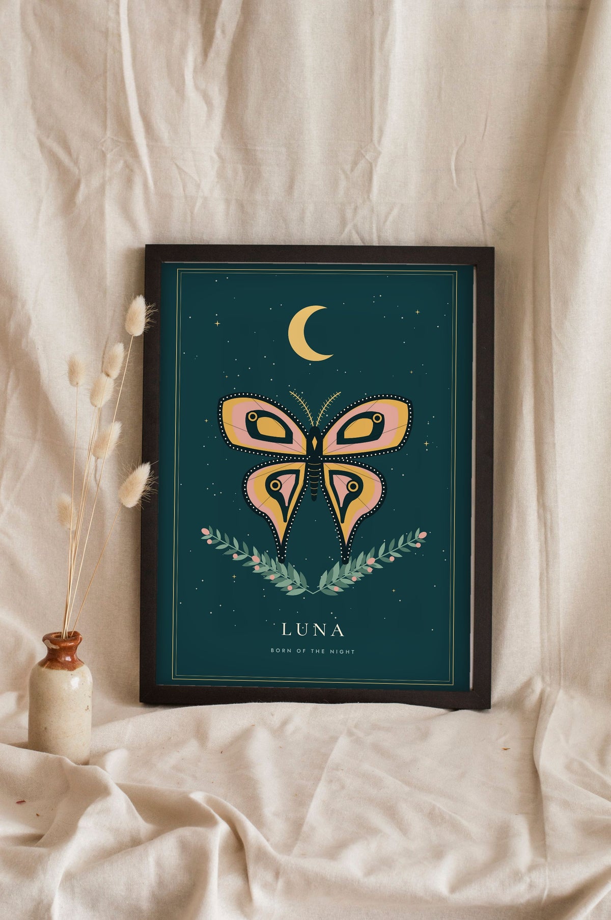 Moth and Moon Print - deep teal moth and moon print leaning on a shelf