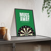 Mugs Away Darts print framed and leaning on a sideboard