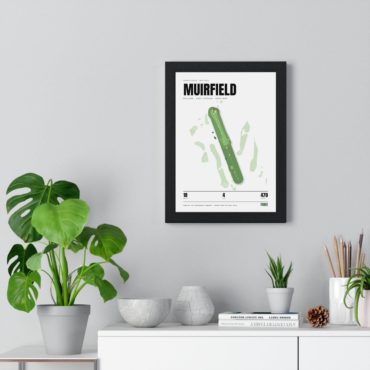 Muirfield 18th Hole White print framed on a living room wall