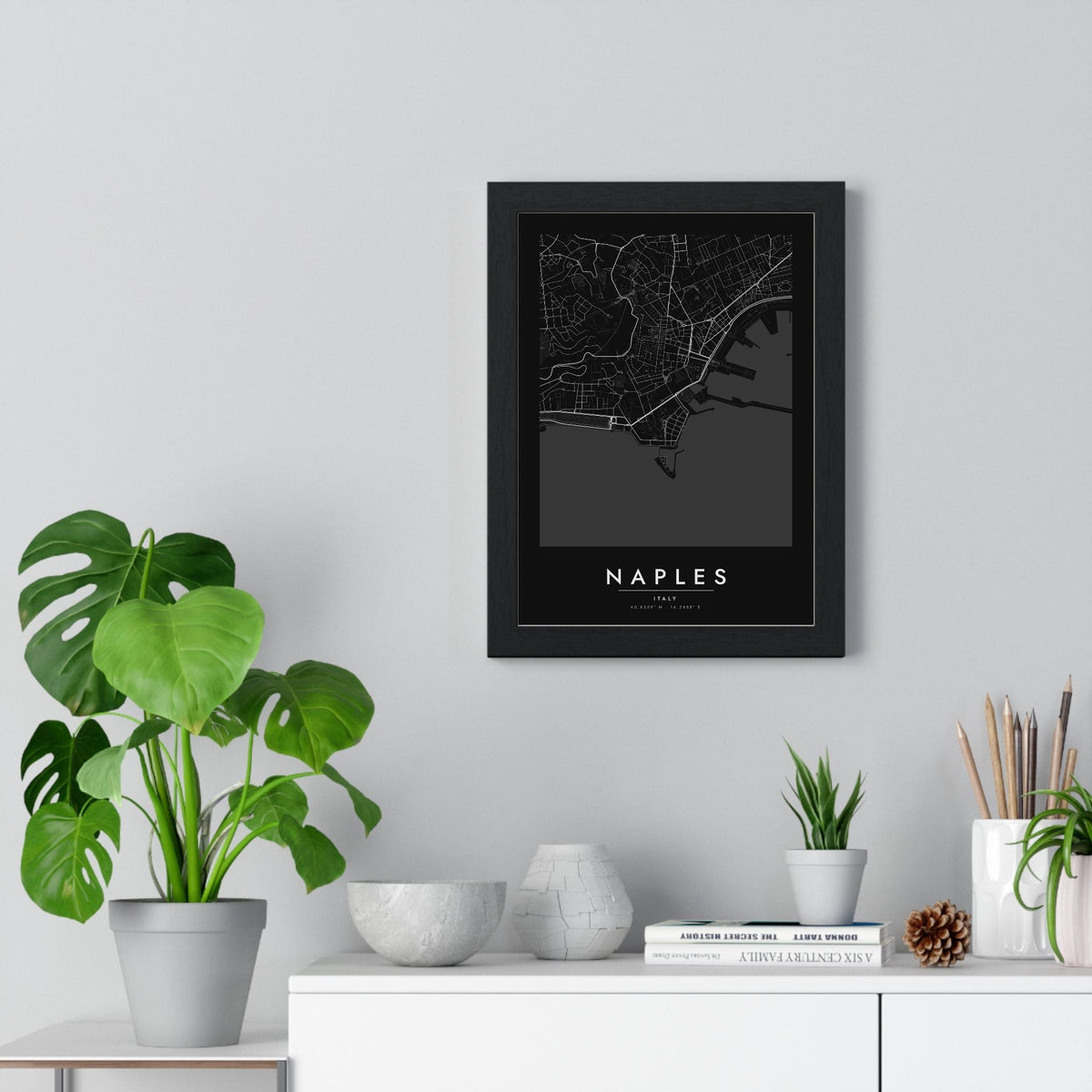 Naples street map poster in black, minimal city map print framed on a living room wall