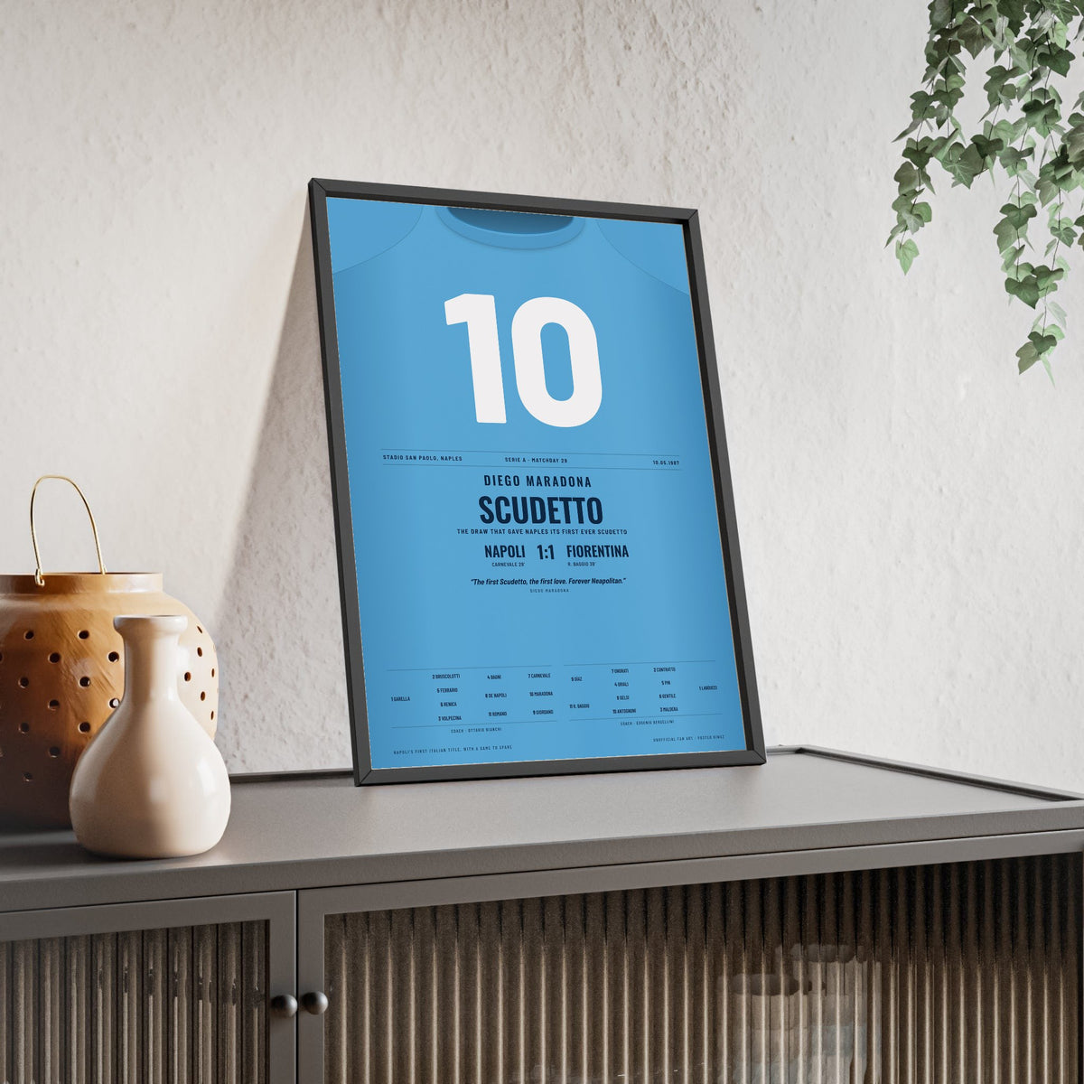 Napoli Scudetto 1987 Poster - Diego Maradona 10 First Serie A Title Shirt Print framed and leaning on a sideboard
