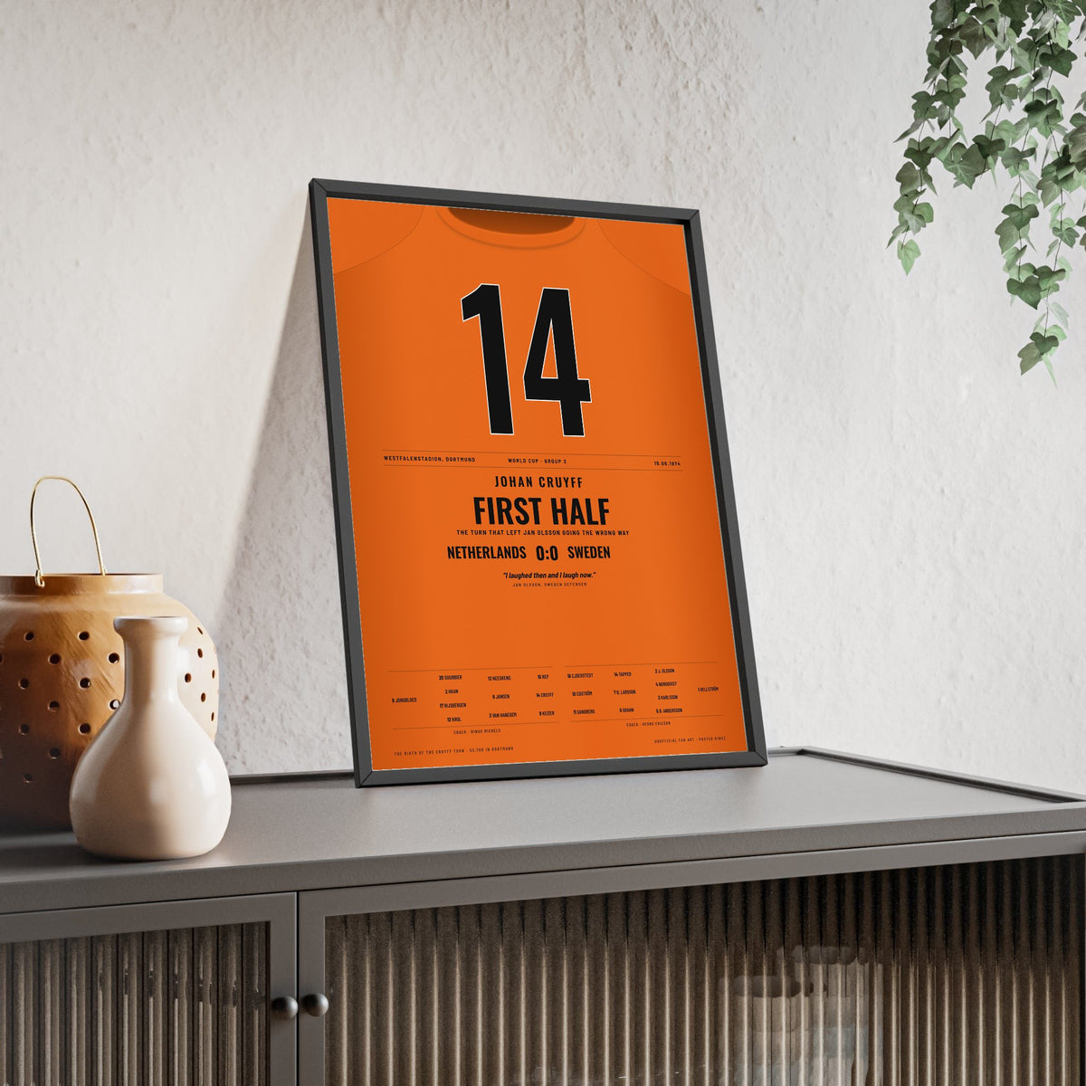 Netherlands World Cup 1974 Poster - Johan Cruyff 14 Cruyff Turn v Sweden Shirt Print framed and leaning on a sideboard