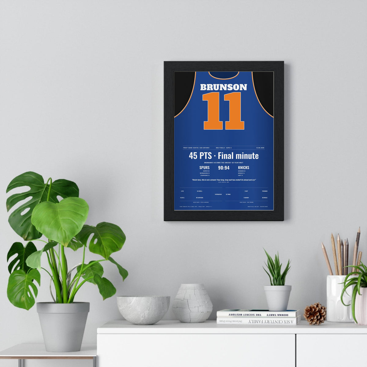 New York Knicks NBA Finals 2026 Game 5 Poster - Jalen Brunson 11 Jersey Print framed on a living room wall