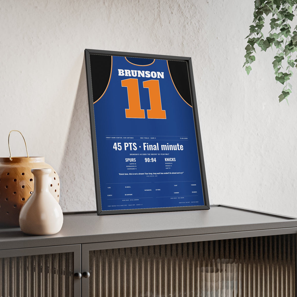 New York Knicks NBA Finals 2026 Game 5 Poster - Jalen Brunson 11 Jersey Print framed and leaning on a sideboard