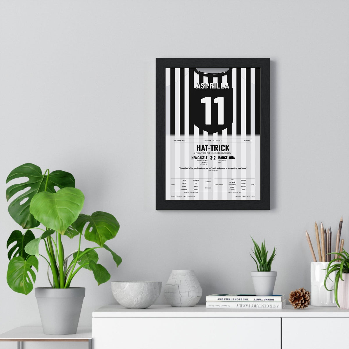 Newcastle 3-2 Barcelona Champions League 1997 Poster - Faustino Asprilla 11 Hat-Trick Shirt Print framed on a living room wall