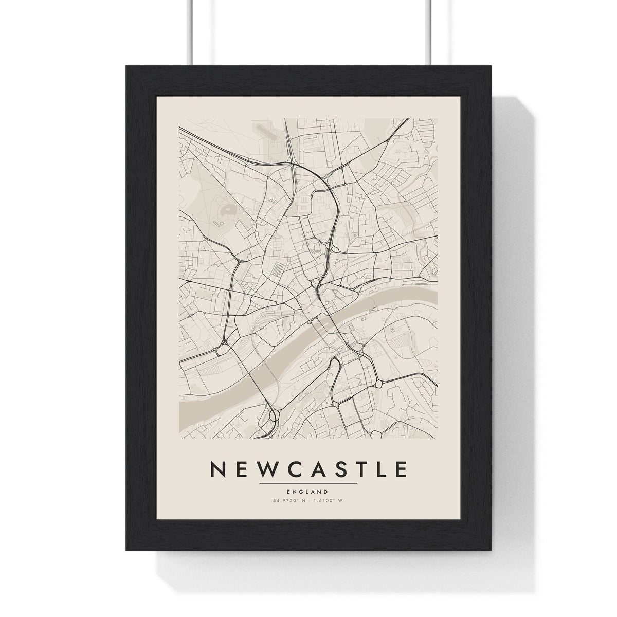Newcastle street map poster in cream, minimal city map print framed in a black frame