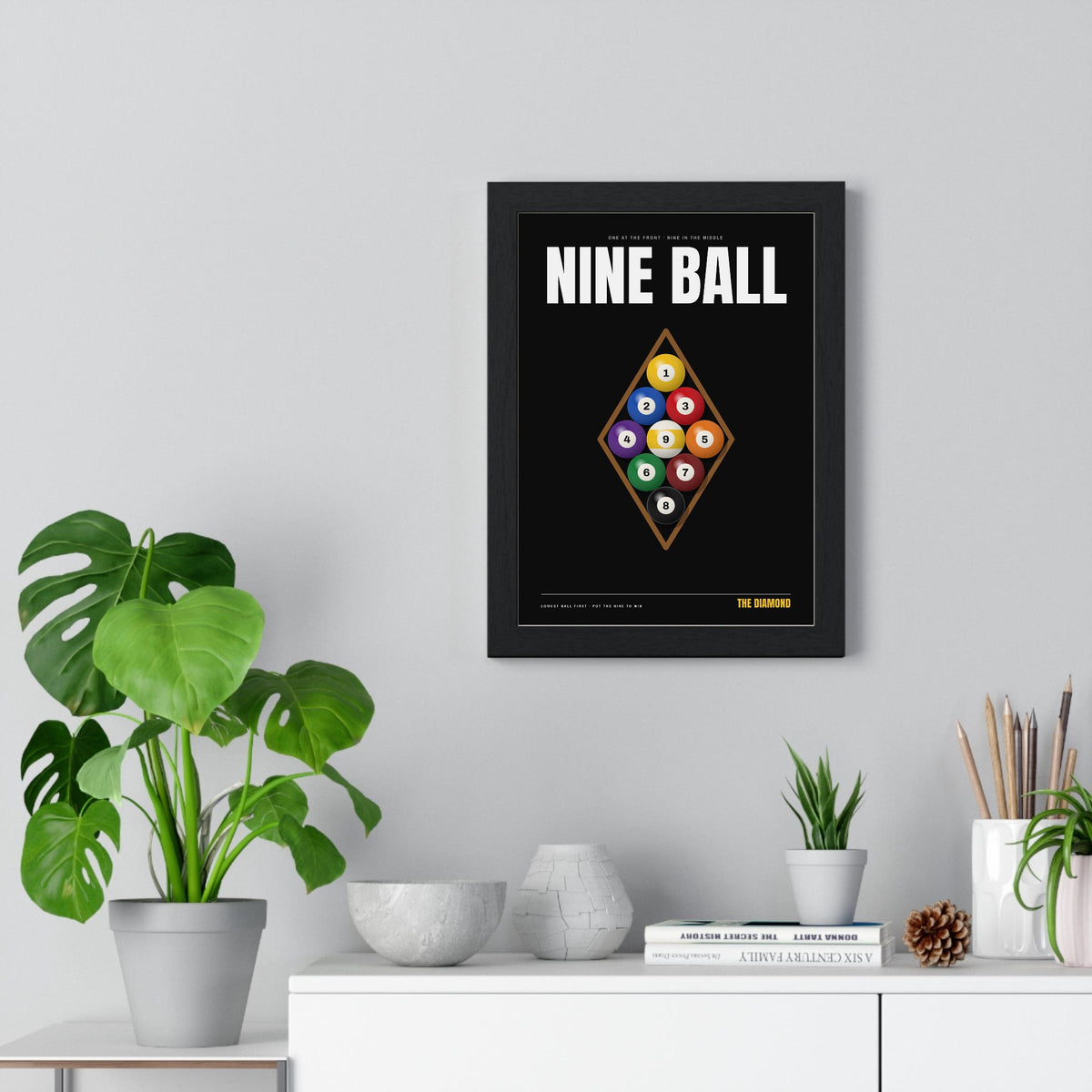 Nine Ball Pool print framed on a living room wall