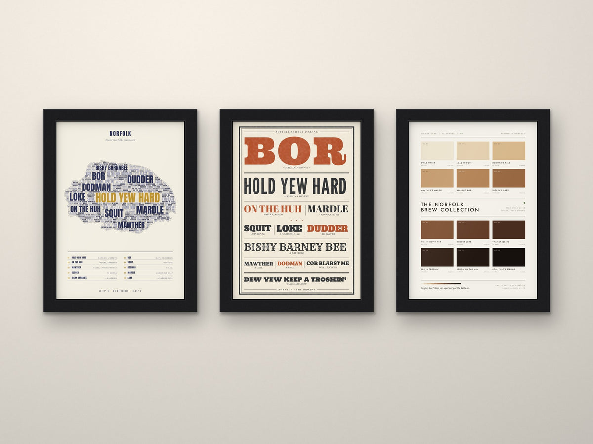 Norfolk Sayings Set of 3 Prints framed side by side on a wall