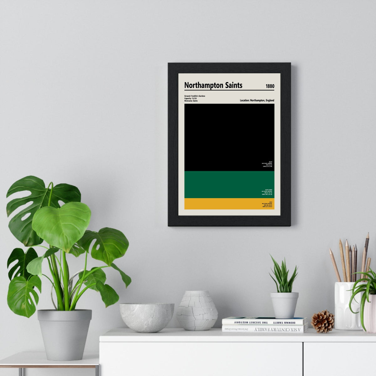 Northampton Saints colour swatch rugby print framed on a living room wall