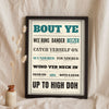 Northern Irish Slang Print in a black frame propped up on linen