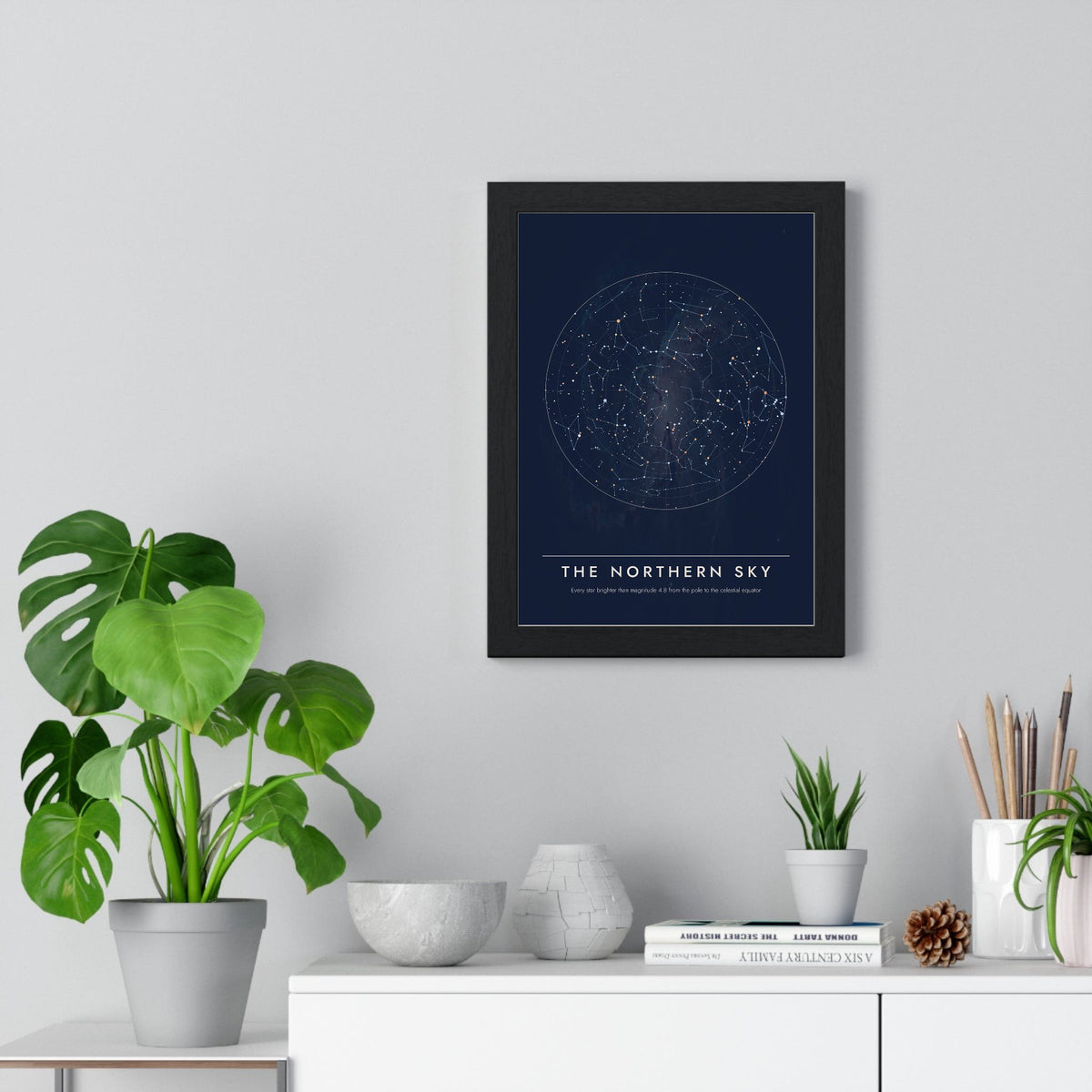 Northern Sky Star Chart print framed on a living room wall