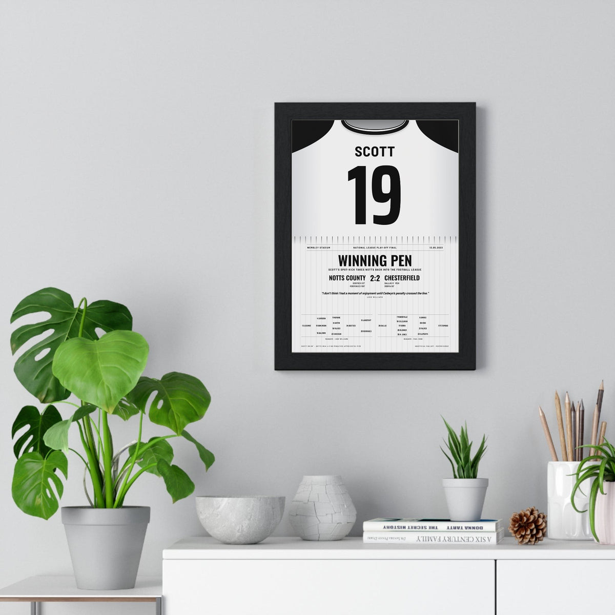 Notts County Play-Off Final 2023 Poster - Cedwyn Scott 19 Wembley Shirt Print framed on a living room wall