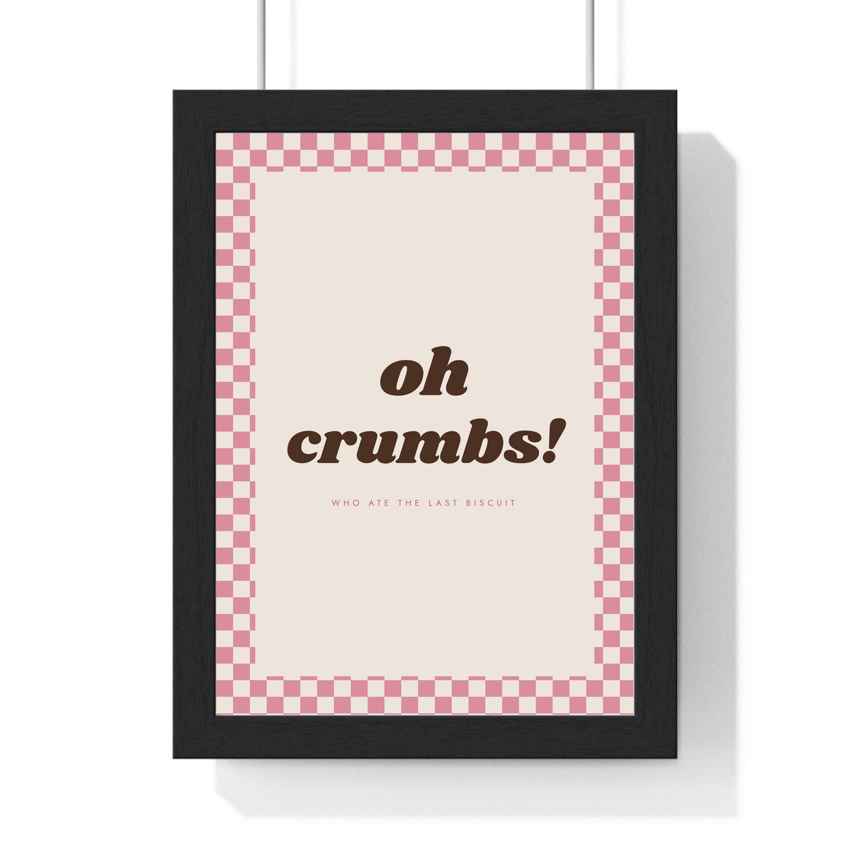 Oh Crumbs Print framed in a black frame, ready to hang