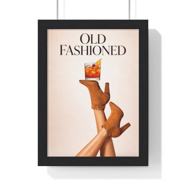 Framed Old Fashioned cocktail fashion poster with amber whisky, orange peel and cherry over tan boots