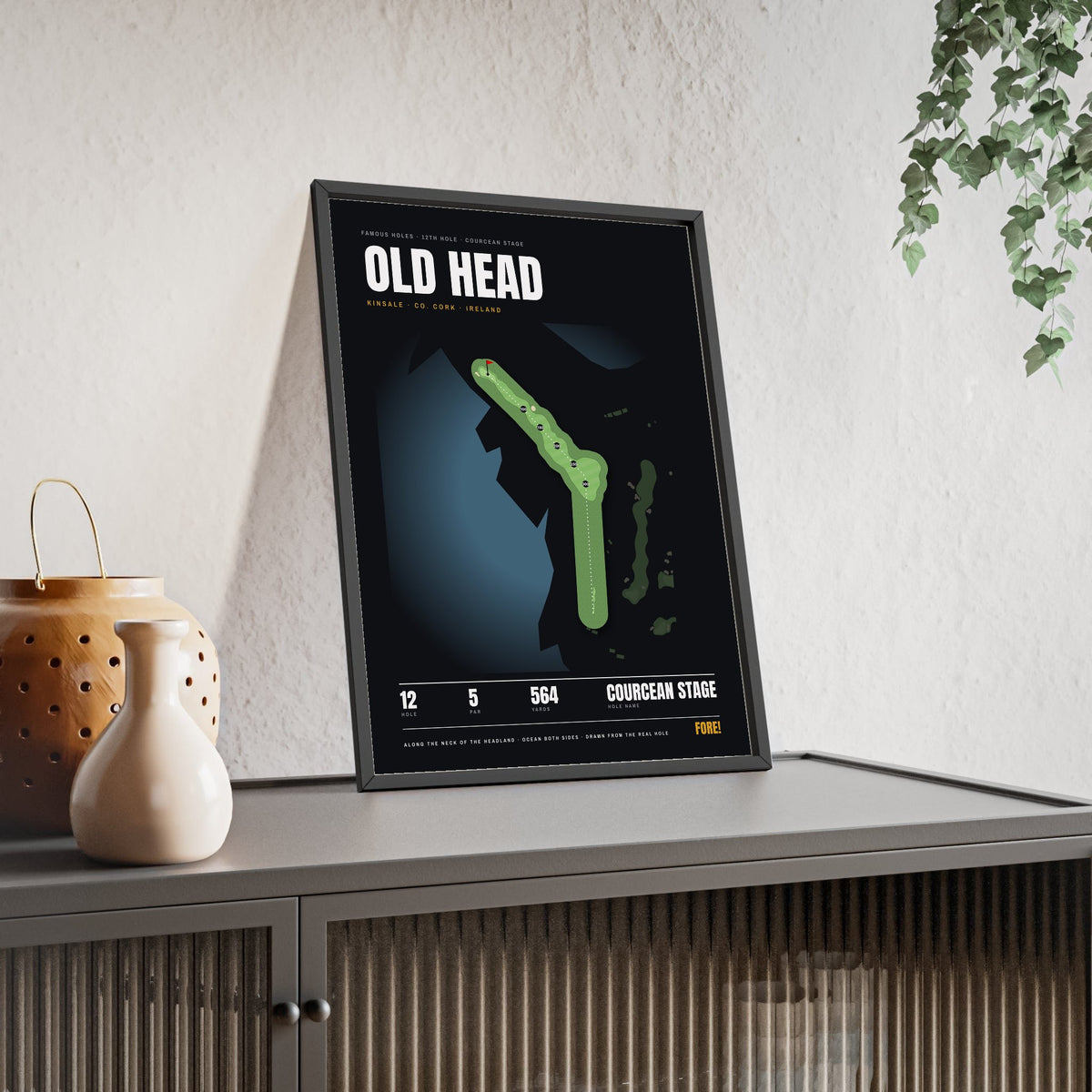 Old Head 12th Hole print framed and leaning on a sideboard