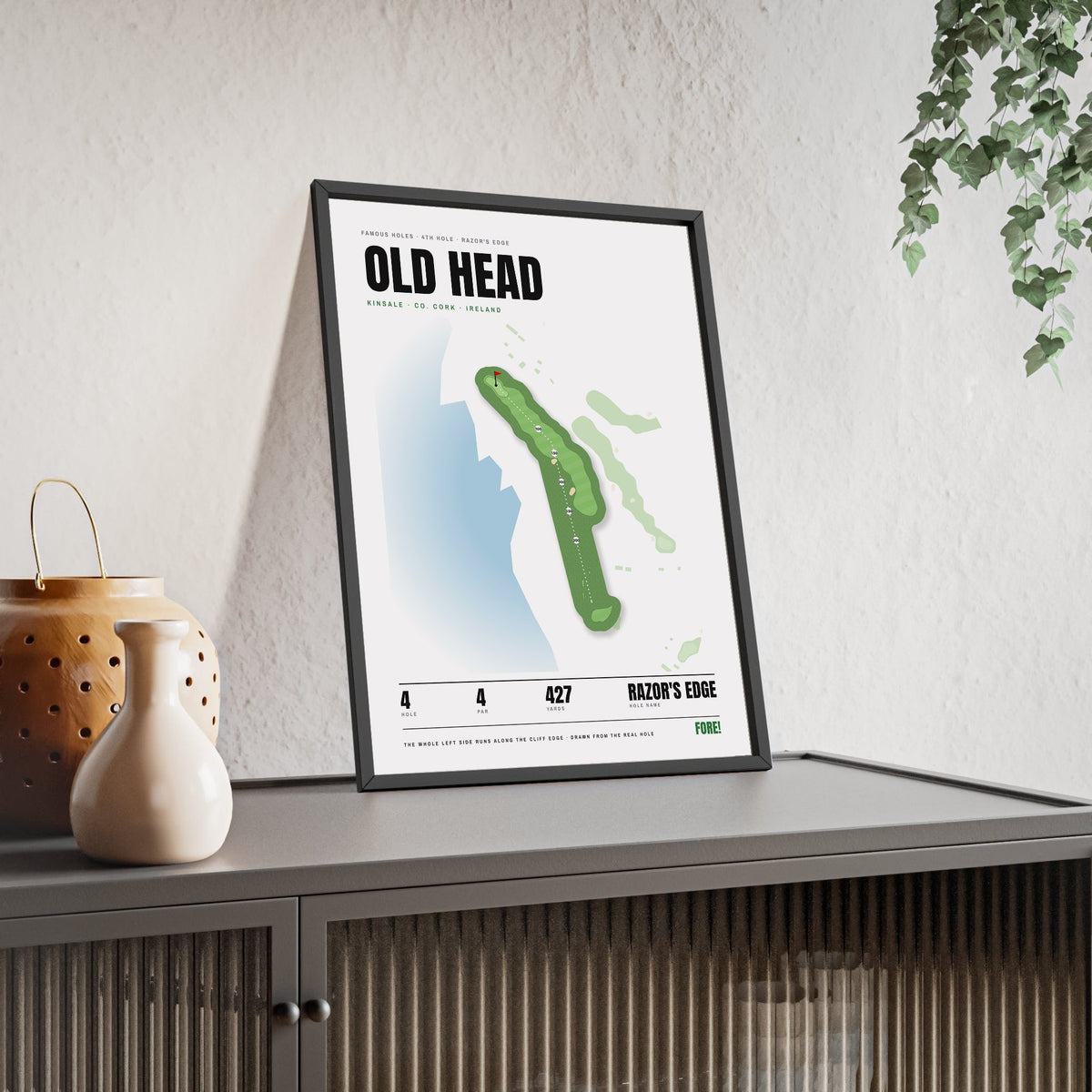 Old Head 4th Hole White print framed and leaning on a sideboard