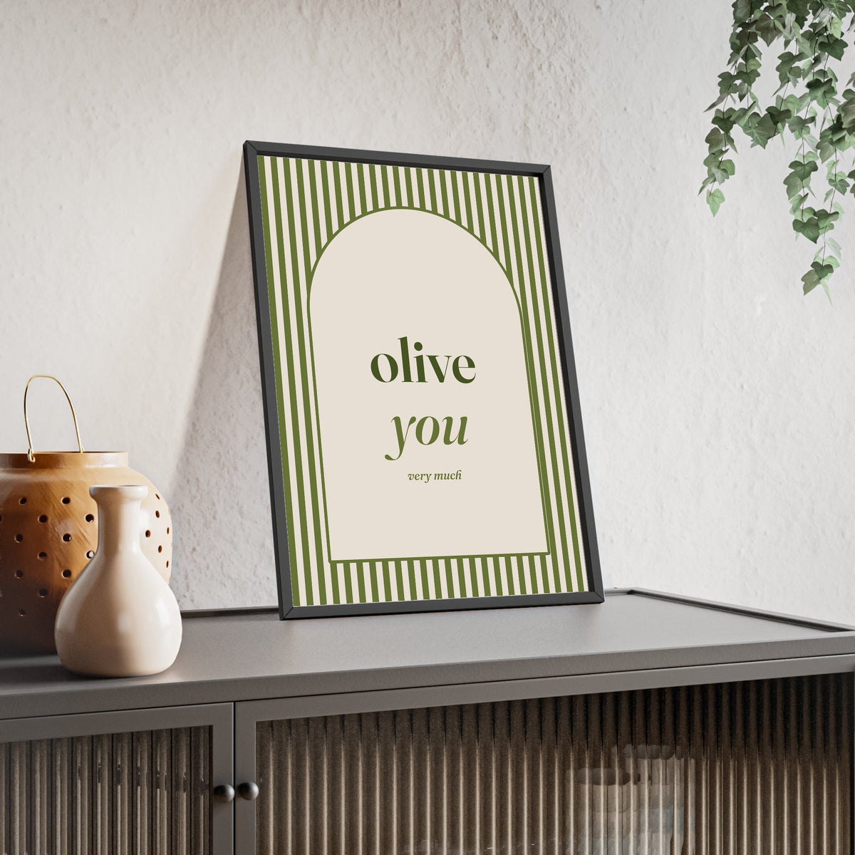 Olive You Print framed and leaning on a sideboard