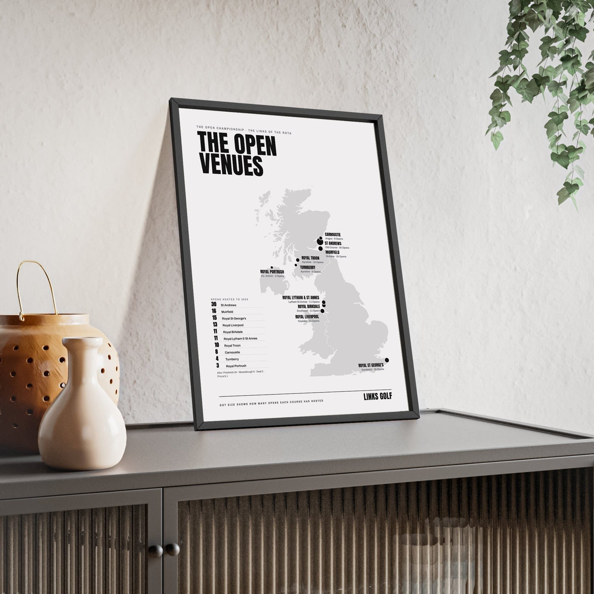 Open Championship Venues Map print framed and leaning on a sideboard