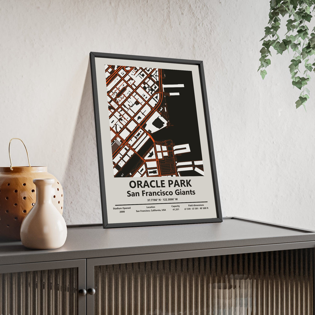 Oracle Park map print framed and leaning on a sideboard