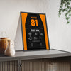 Oscar Piastri 2024 Hungarian Grand Prix Win Poster - 81 Race Suit Print framed and leaning on a sideboard