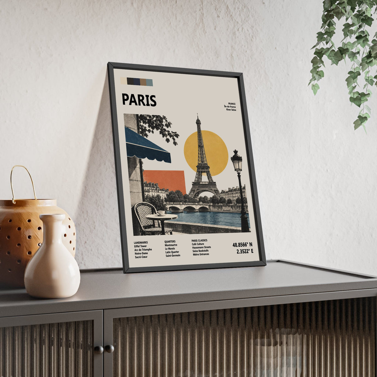 Paris Mid Century Travel print framed and leaning on a sideboard