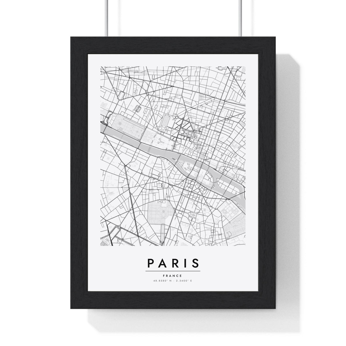 Paris street map poster in white, minimal city map print framed in a black frame
