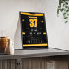 Patrice Bergeron 2013 Game 7 Overtime Winner Poster - Boston Bruins 37 Hockey Jersey Print framed and leaning on a sideboard