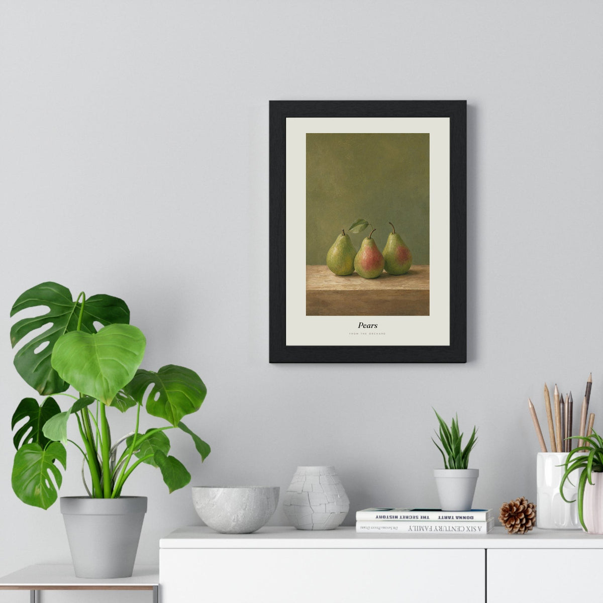 Pears Print framed on a living room wall