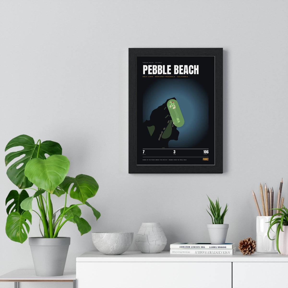 Pebble Beach 7th Hole print framed on a living room wall