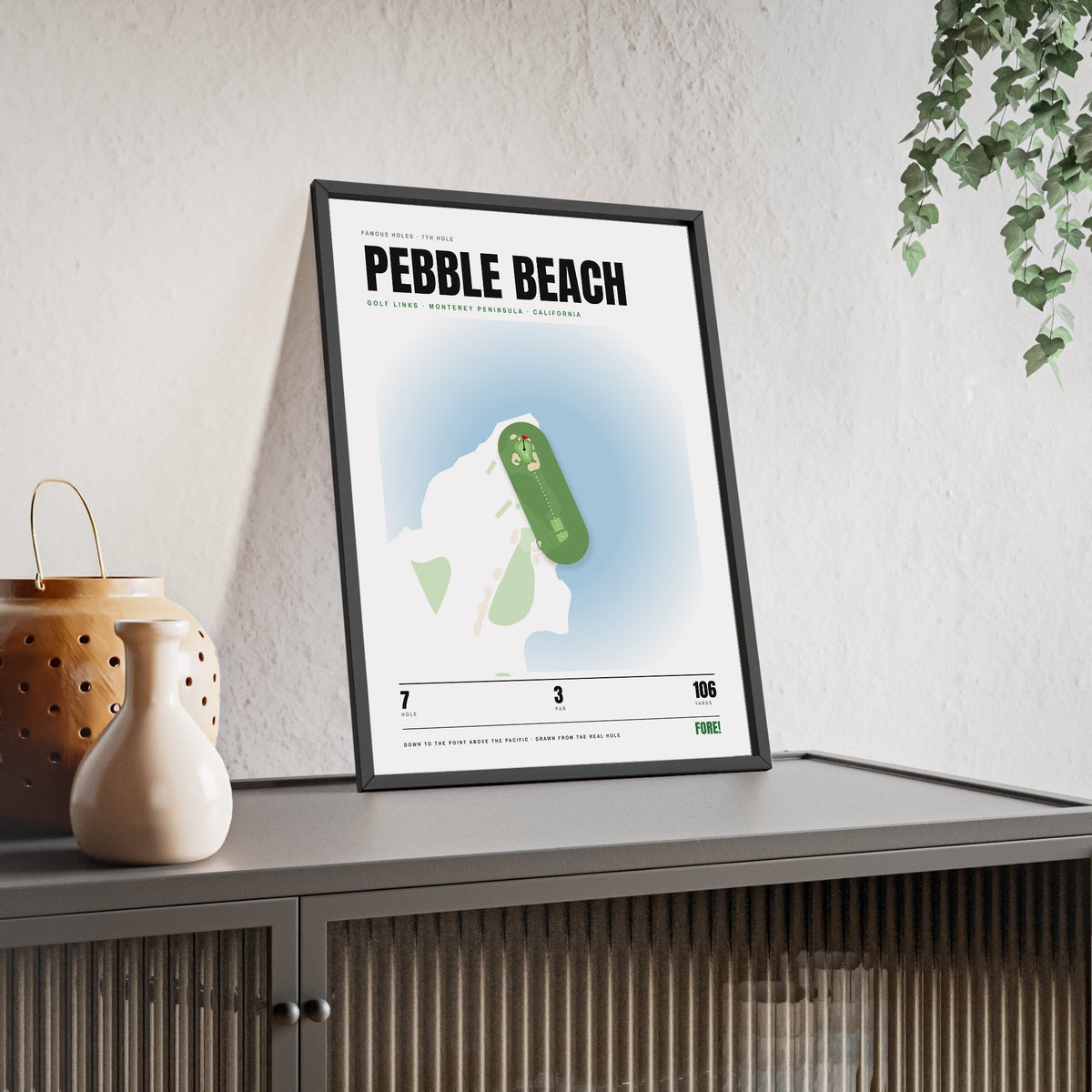 Pebble Beach 7th Hole White print framed and leaning on a sideboard