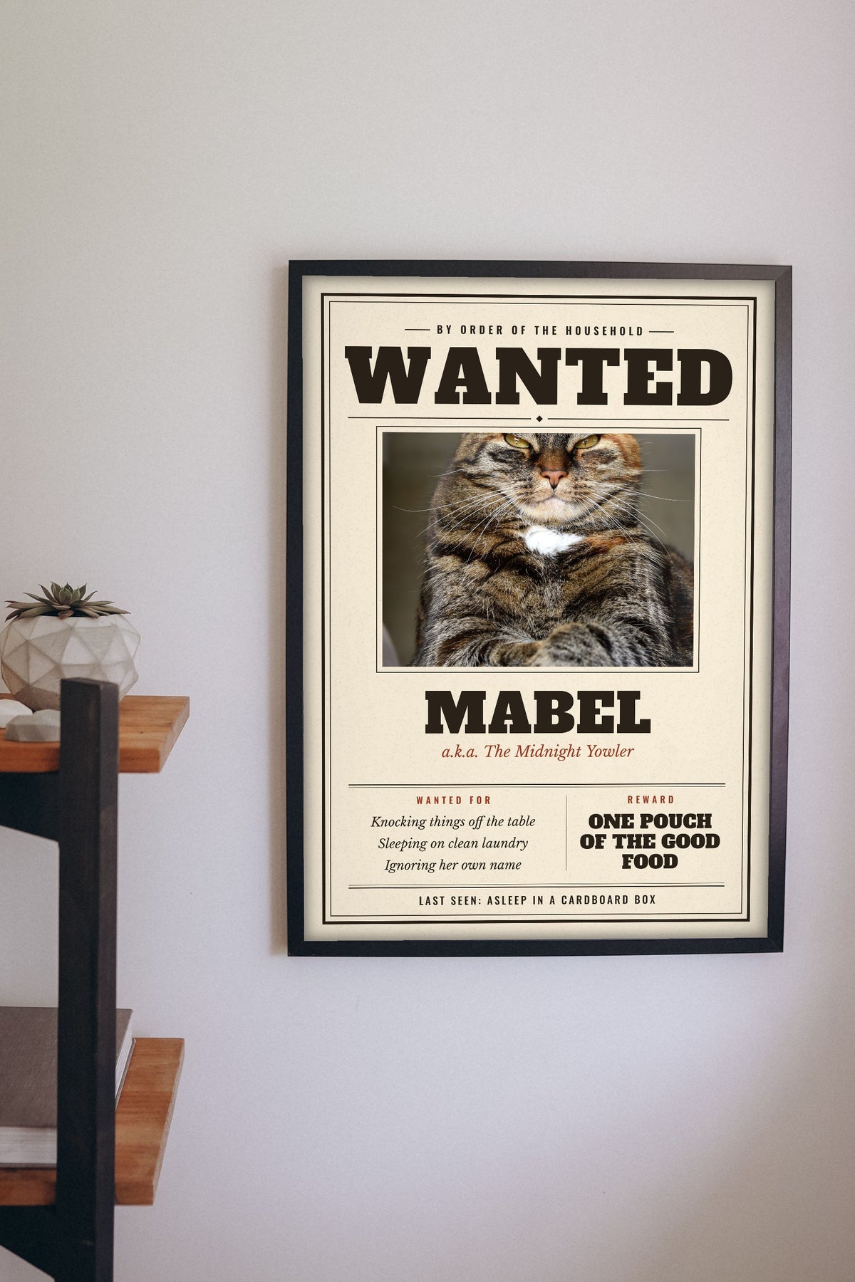 Personalised Cat Wanted Poster Print - hanging on a living room wall