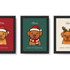 Three framed personalised Christmas pet portraits showing the Santa hat, hat and scarf, and reindeer antler styles