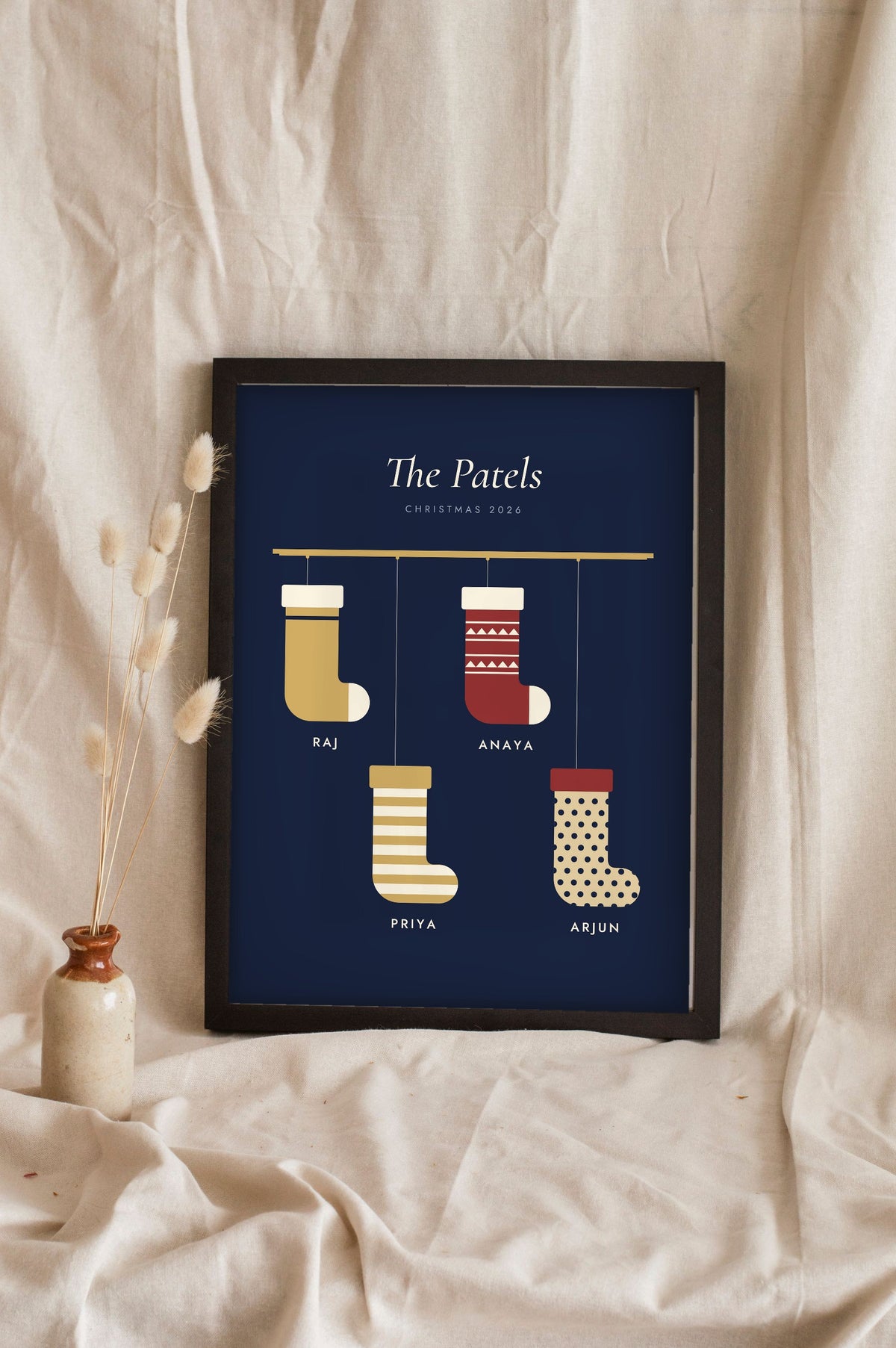 Personalised Christmas Stocking Print - navy and gold stocking print leaning on a shelf