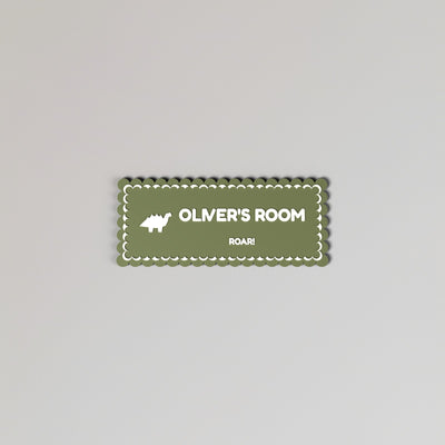 Personalised Dinosaur Door Sign - personalised dinosaur door sign on the wall