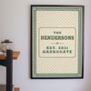 Personalised Family Name Mosaic Print - green and cream mosaic name print on a hallway wall